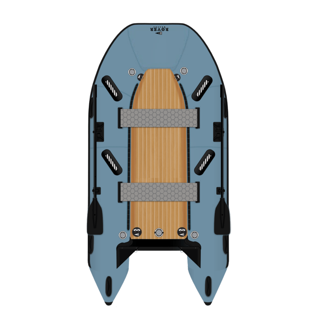 Top view of Rover Marine inflatable boat with wooden deck, mounted oars, and blue pontoons.