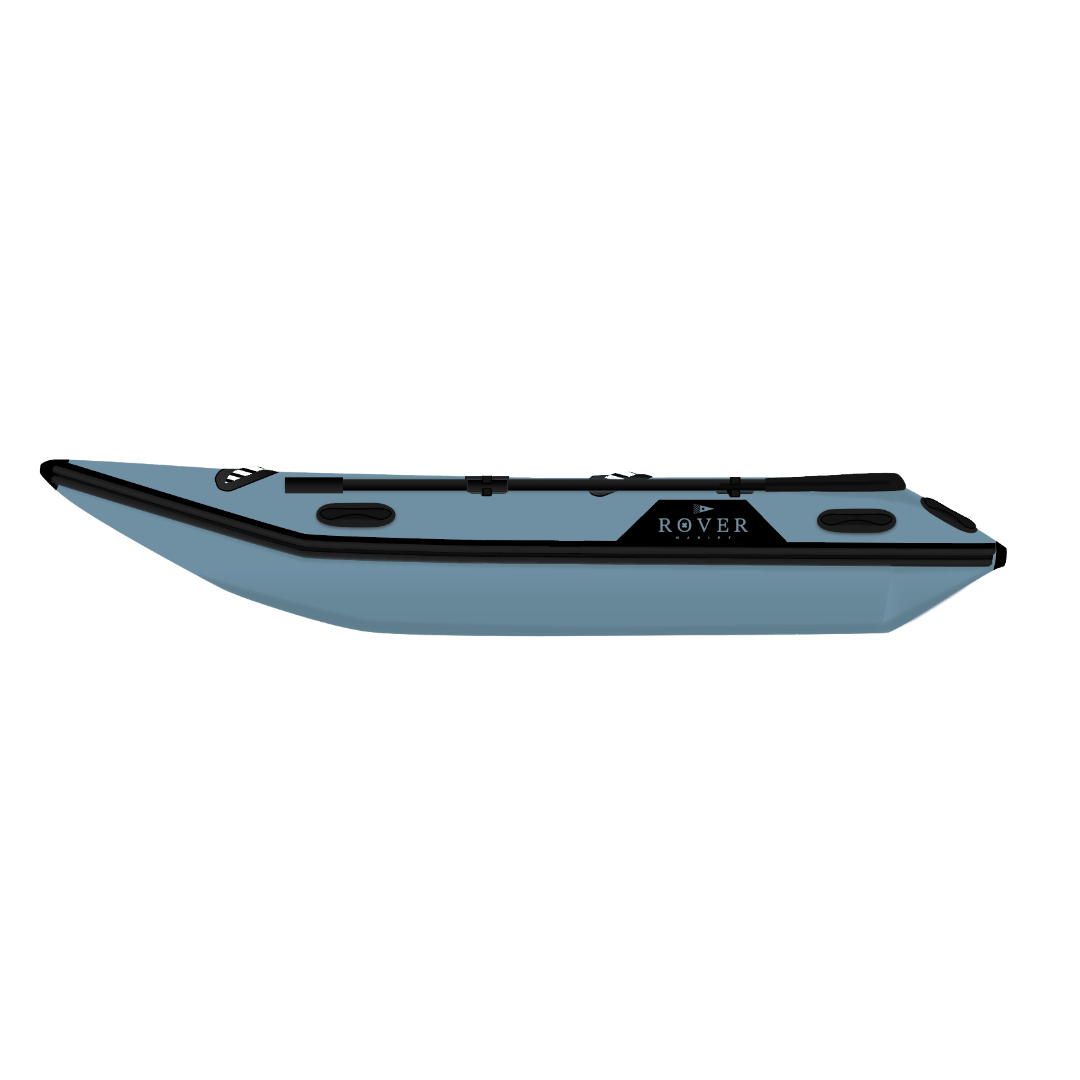 ide profile view of Rover Marine inflatable boat in blue with black trim.