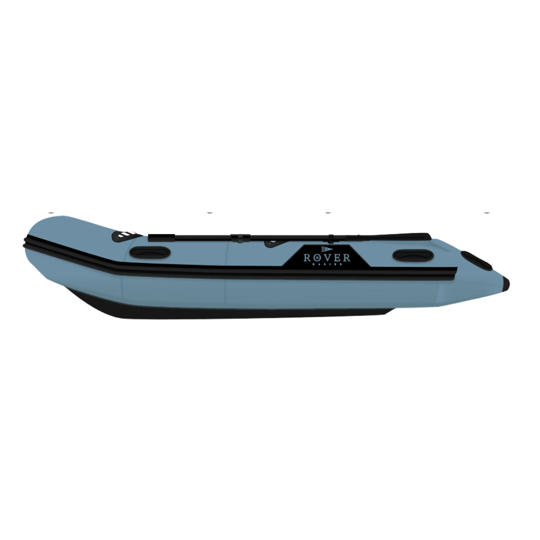 Side profile view of Rover Marine inflatable boat in blue with black trim.